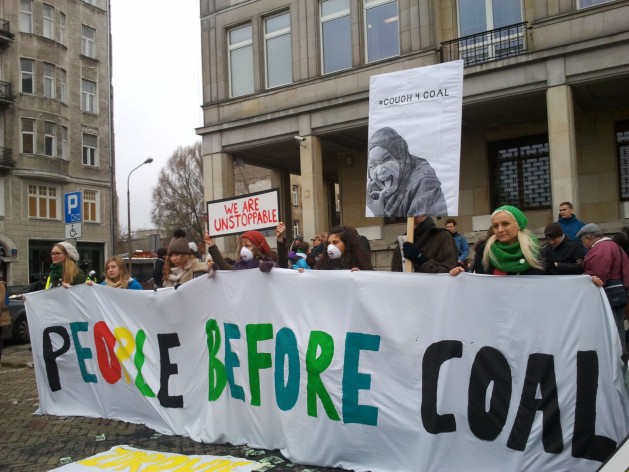 Environmentalists protesting Monday morning outside Polish Ministry of Economy as the coal summit kicks off inside. Credit: Claudia Ciobanu/IPS
