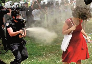 The photo of the woman in red deserves its place as the ultimate iconic image of the protests in Turkey. AFP photo